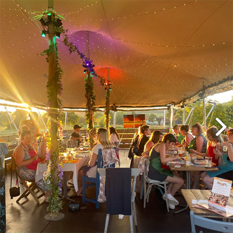 People dining under a gazebo
